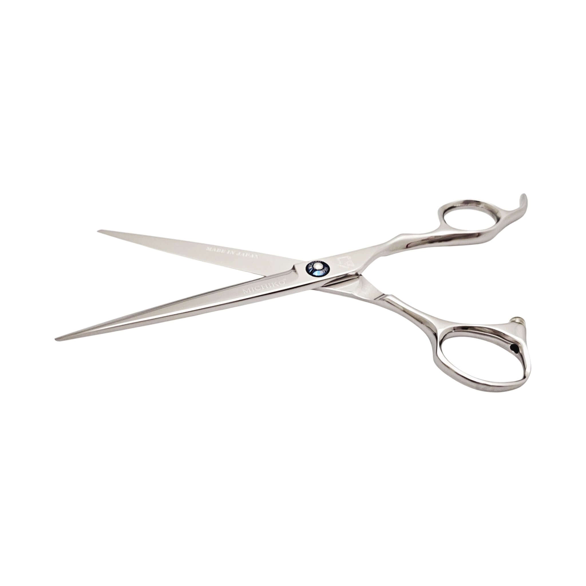 Stainless steel hair cutting scissors on a white background