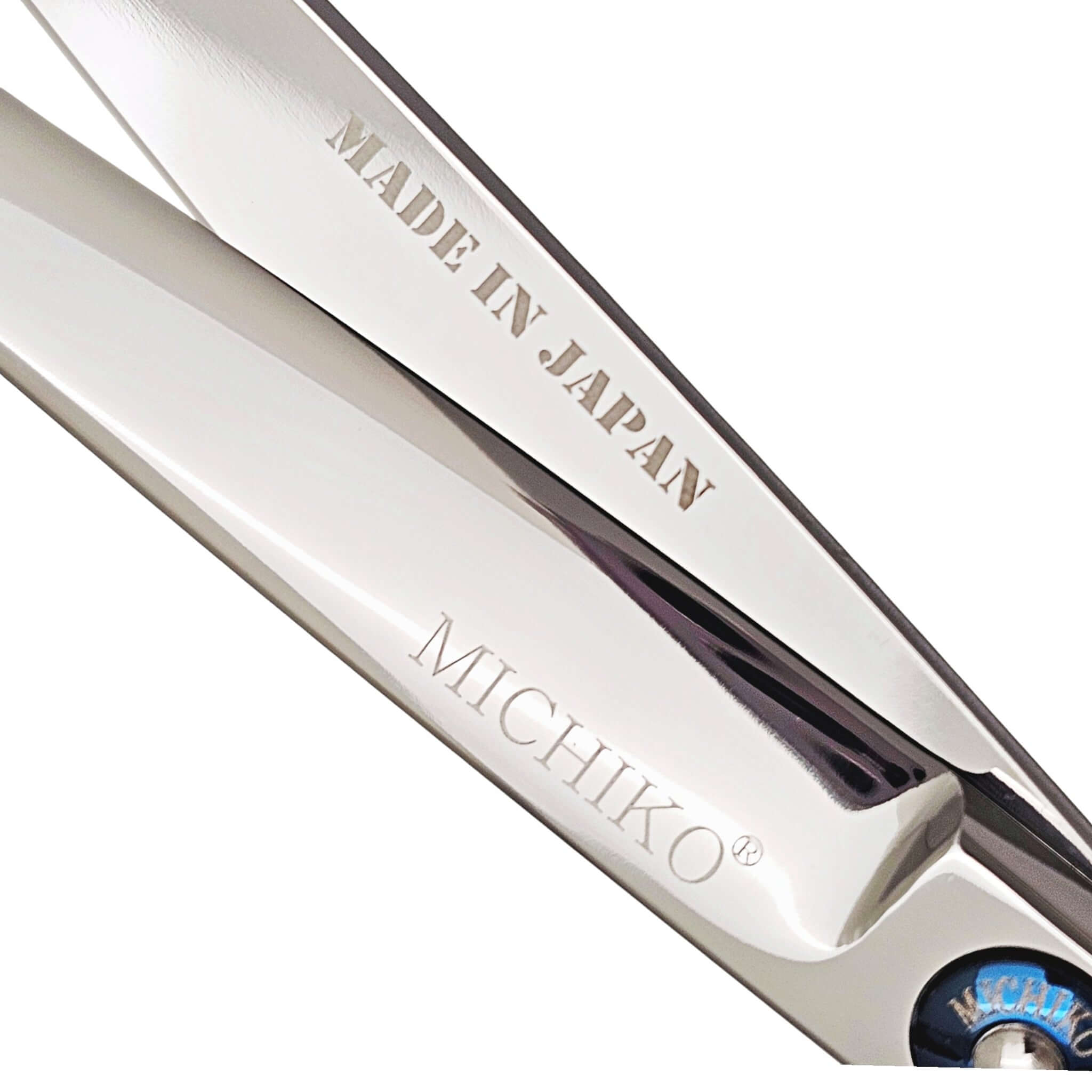Hair shears with 'Made in Japan' and 'Michiko' branding on a white background