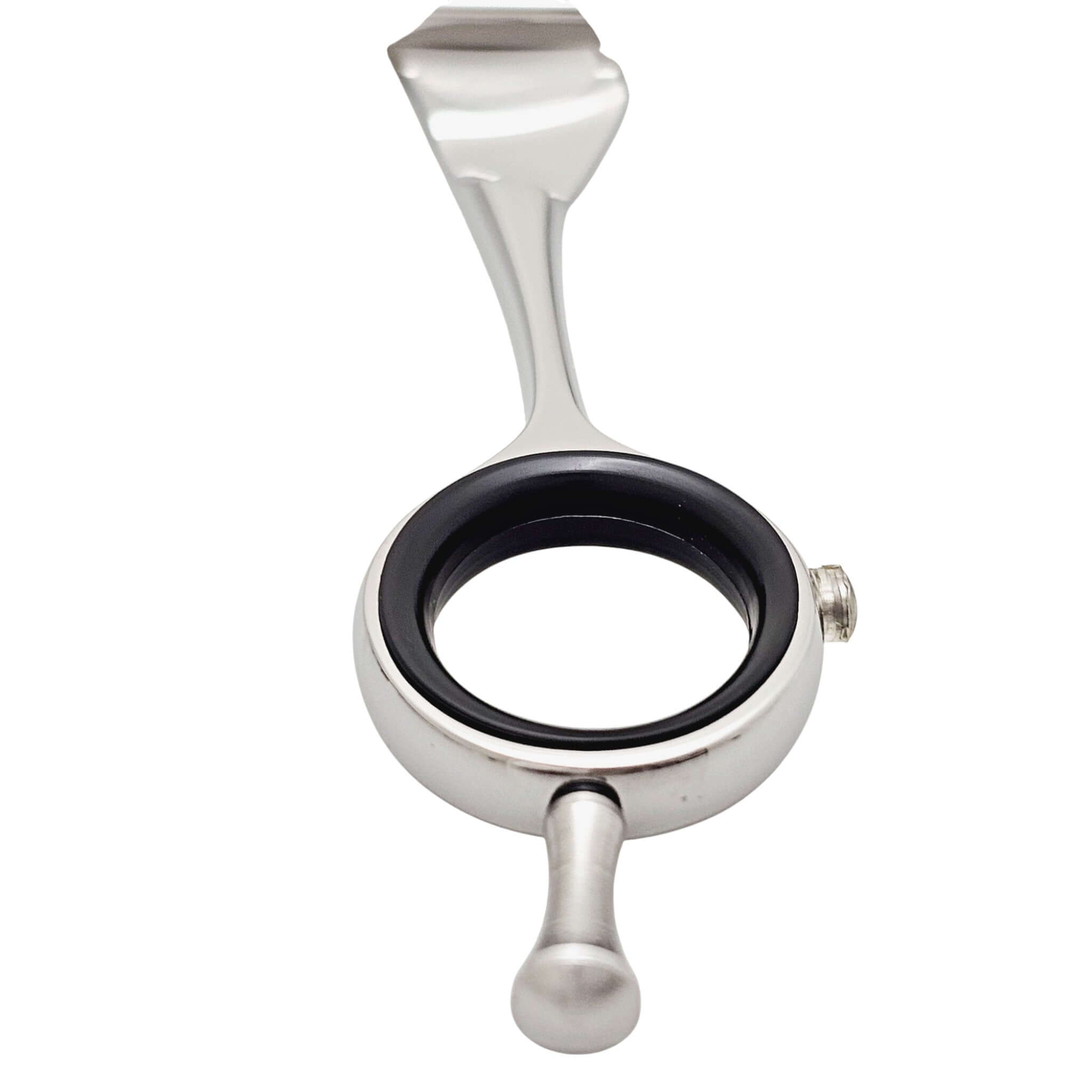Close-up of a finger ring of hair cutting scissors on a white background