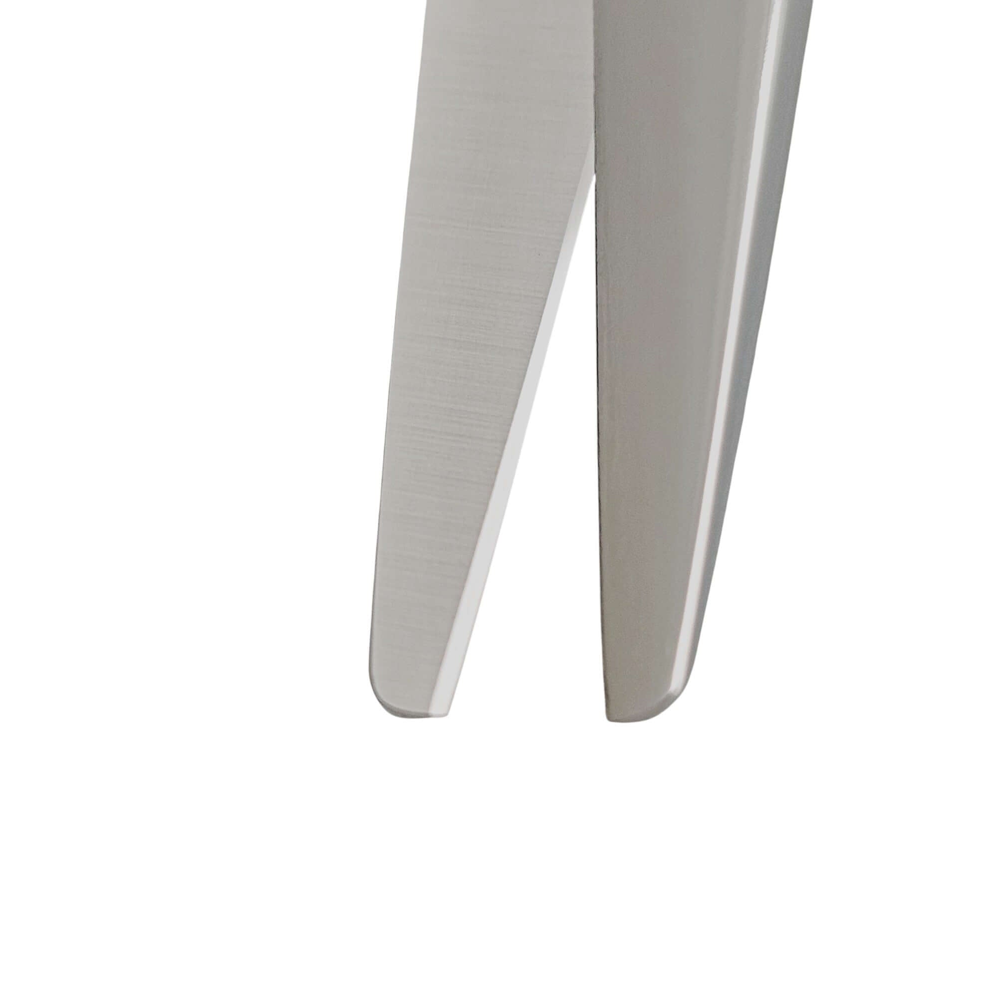Close-up of hair scissors blades on a white background