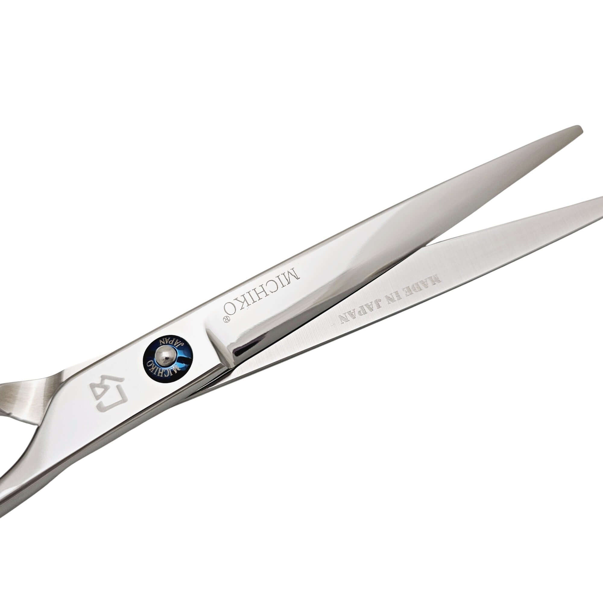 Hair cutting scissors with 'Michiko' branding on a white background