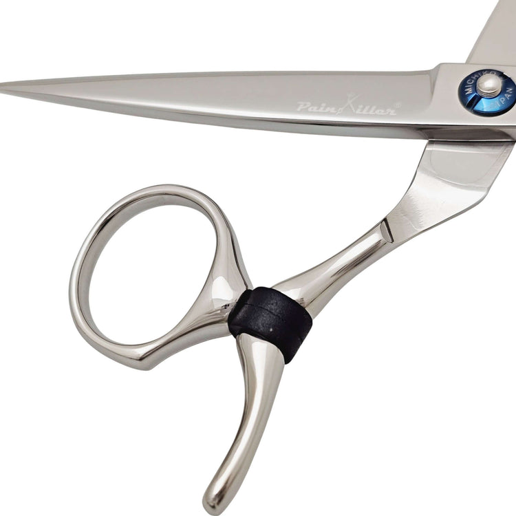 Close-up of a pair of silver swivel hair scissors on a white background
