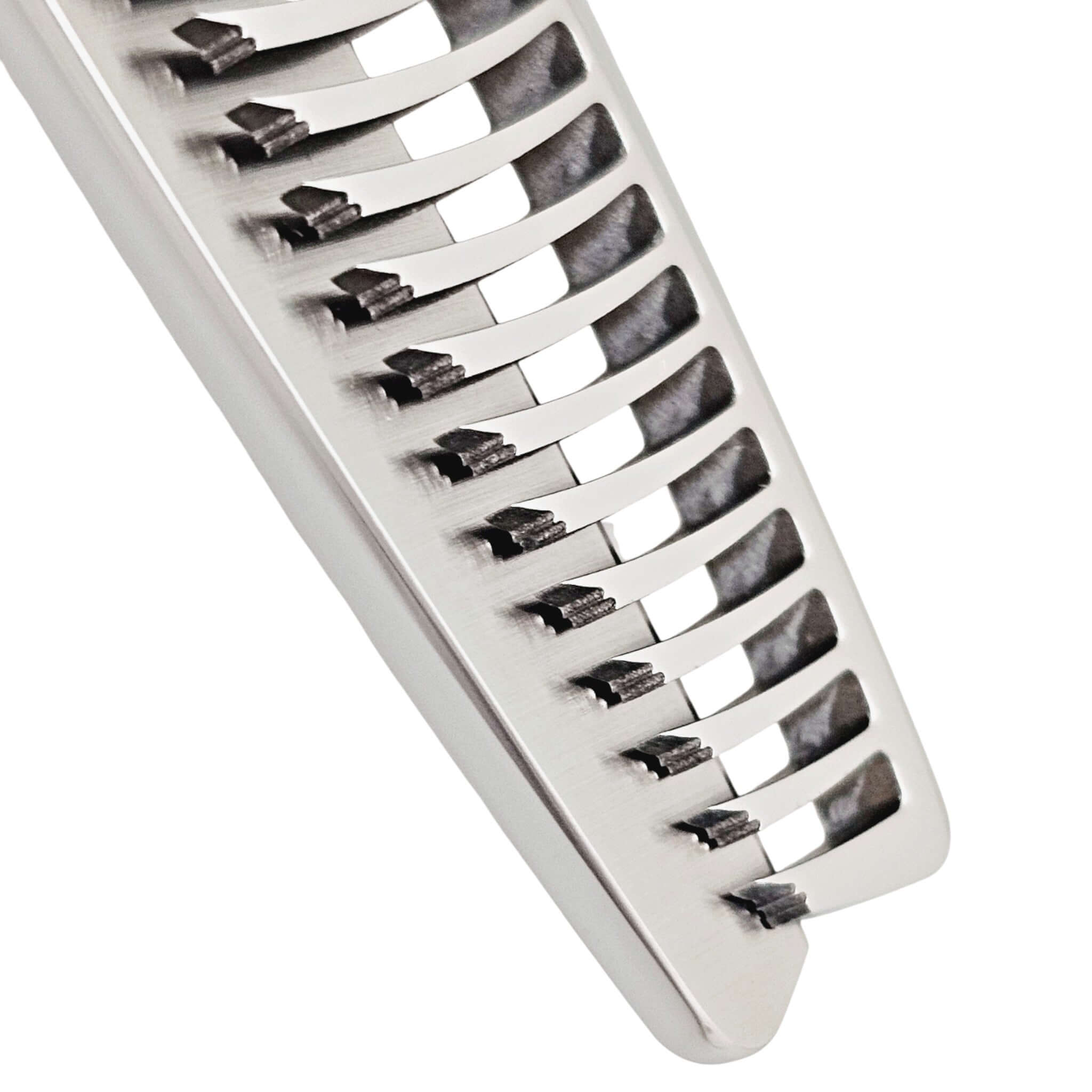 Close-up of hair thinning blade on a white background