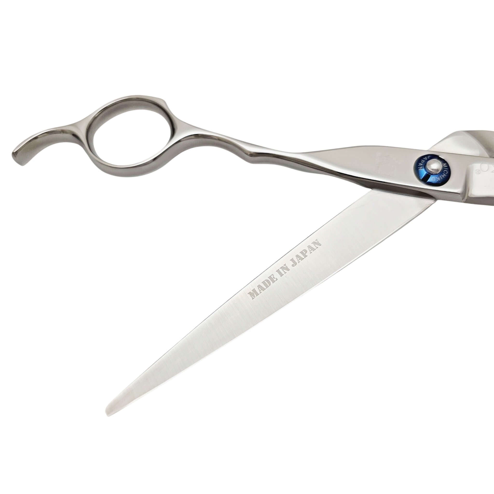 Hair cutting shears with 'Made in Japan' text on a white background