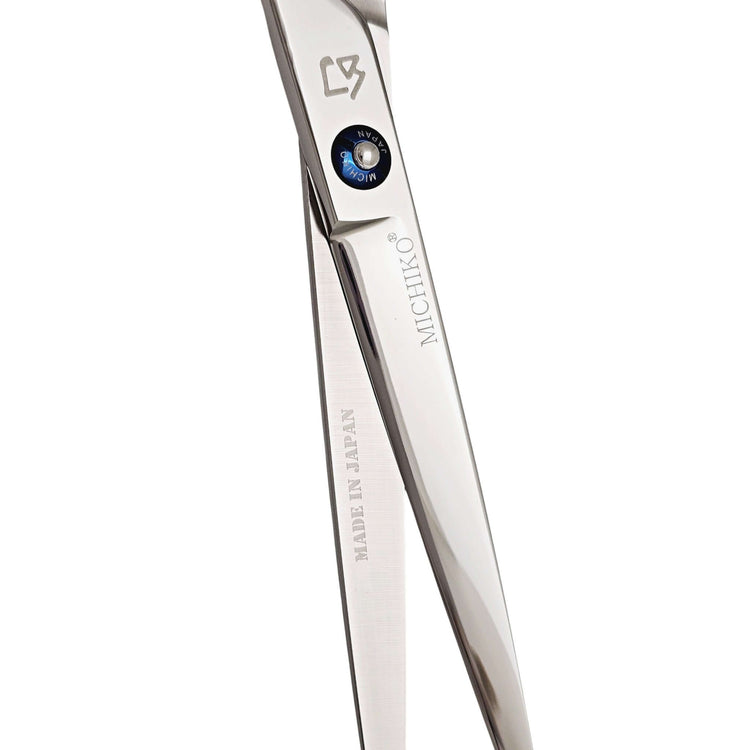 Hair shears with 'MICHIKO' branding on a white background