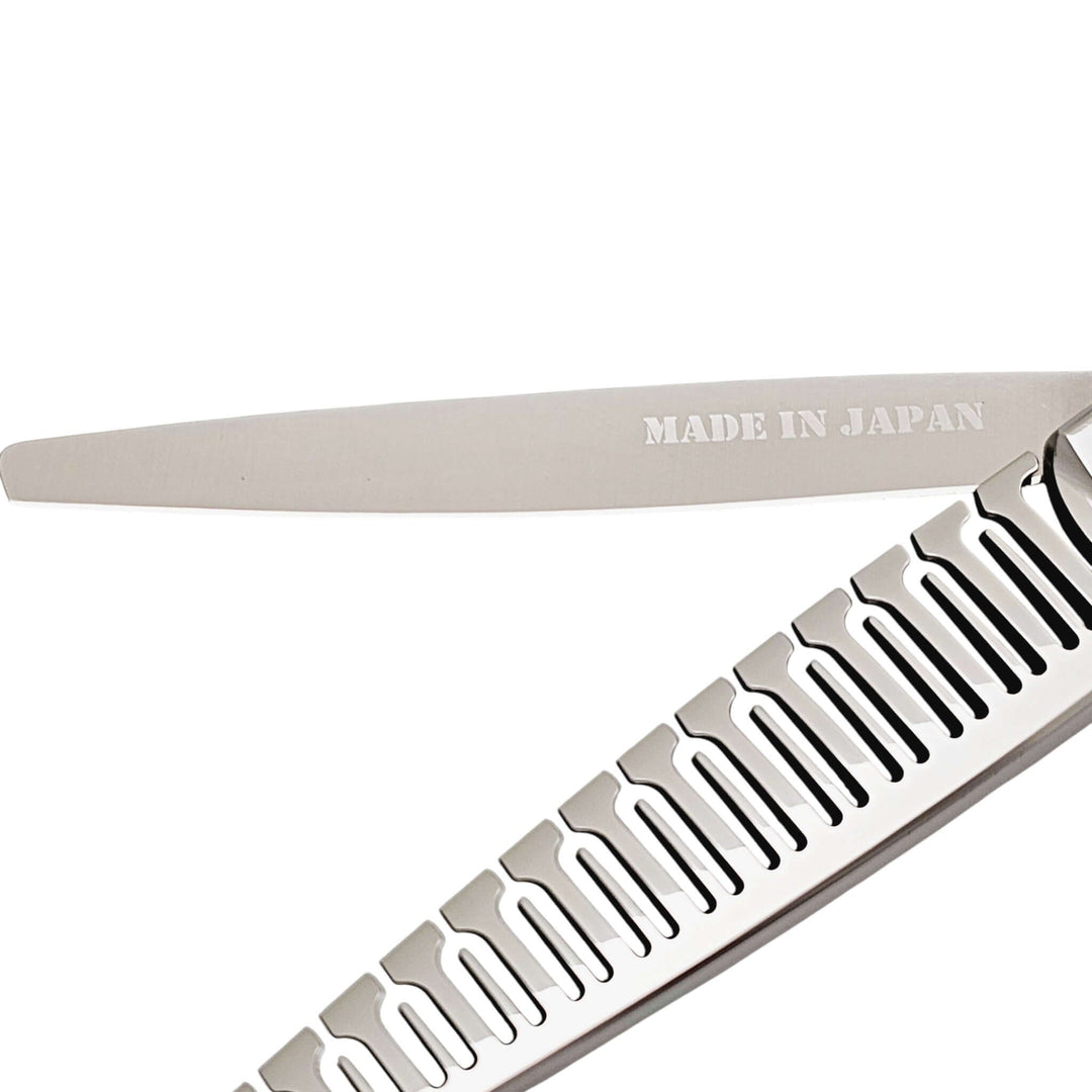 Hair texturizer blades with 'MADE IN JAPAN' text on a white background