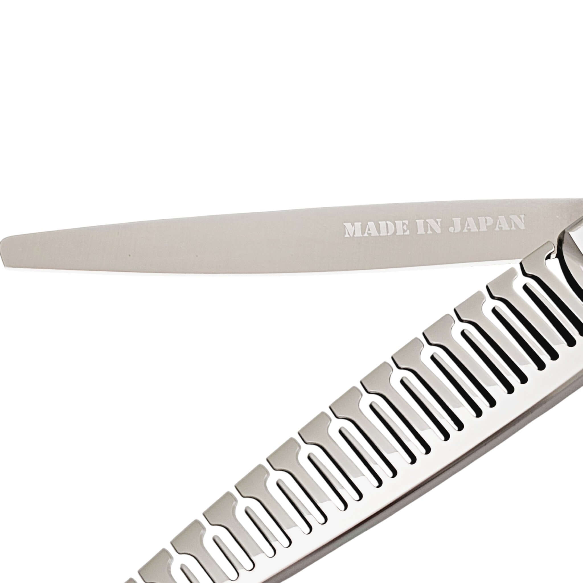 Hair texturizer blades with 'MADE IN JAPAN' text on a white background