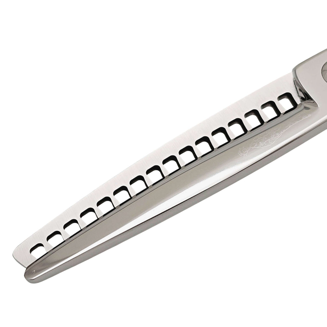 Close-up of hair texturizing shears on a white background