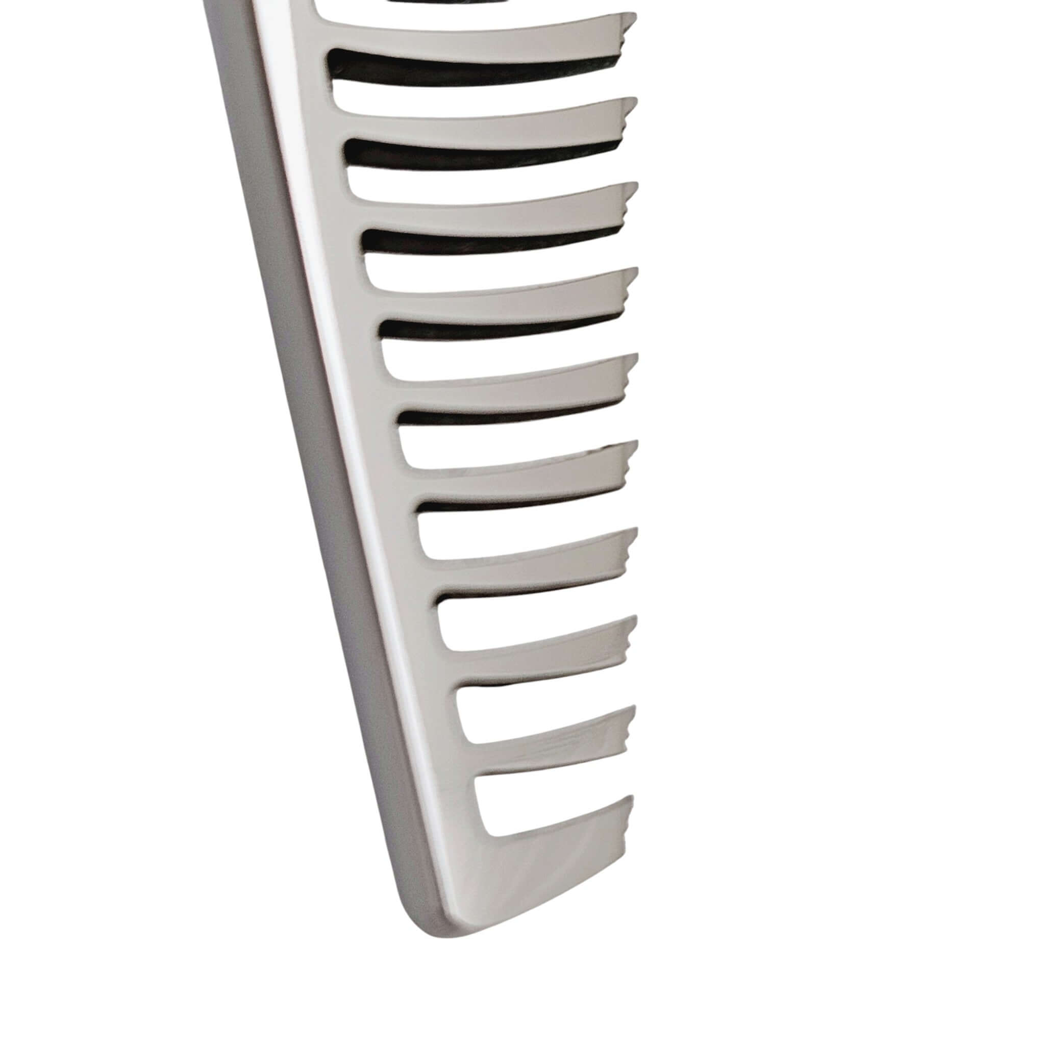 Close-up of hair thinning shears on a white background