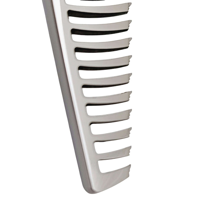 Close-up of hair thinning shears on a white background