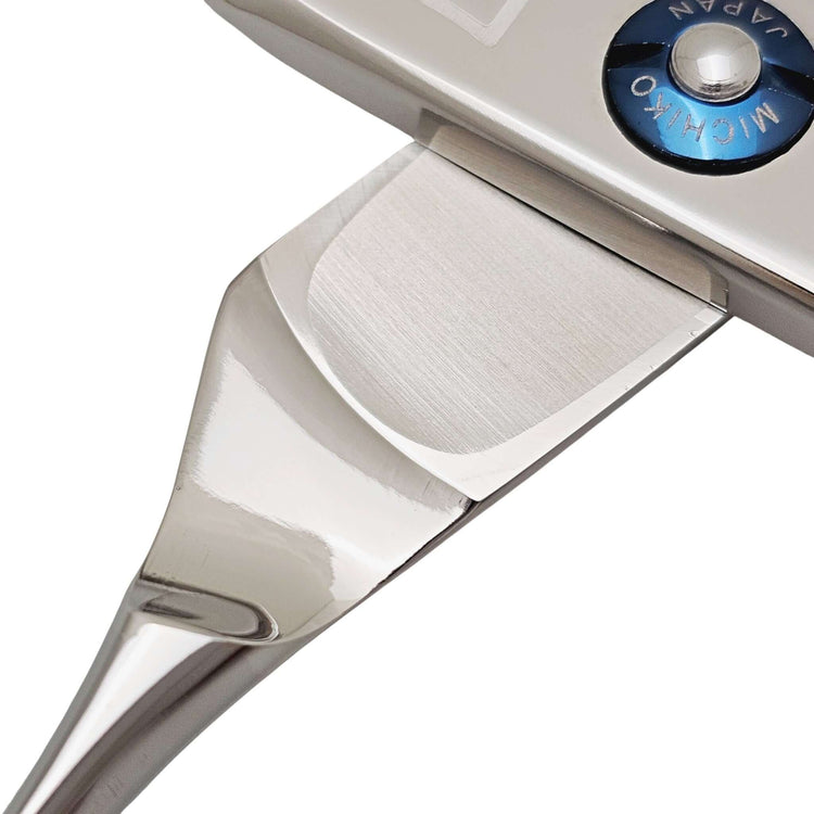 Close-up of a pair of hair scissros on a white background