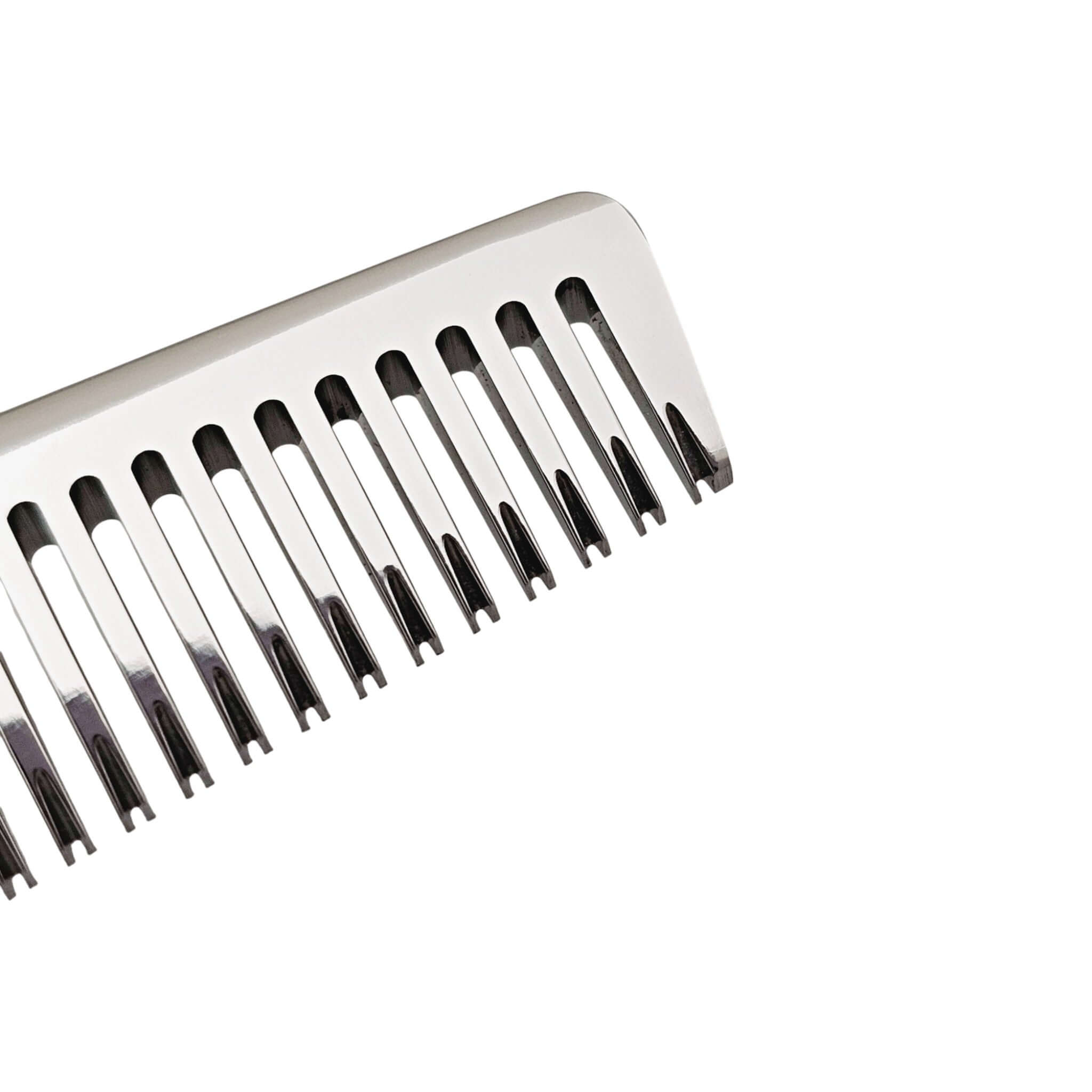 Metal teeth from the barber thinning shears on a white background