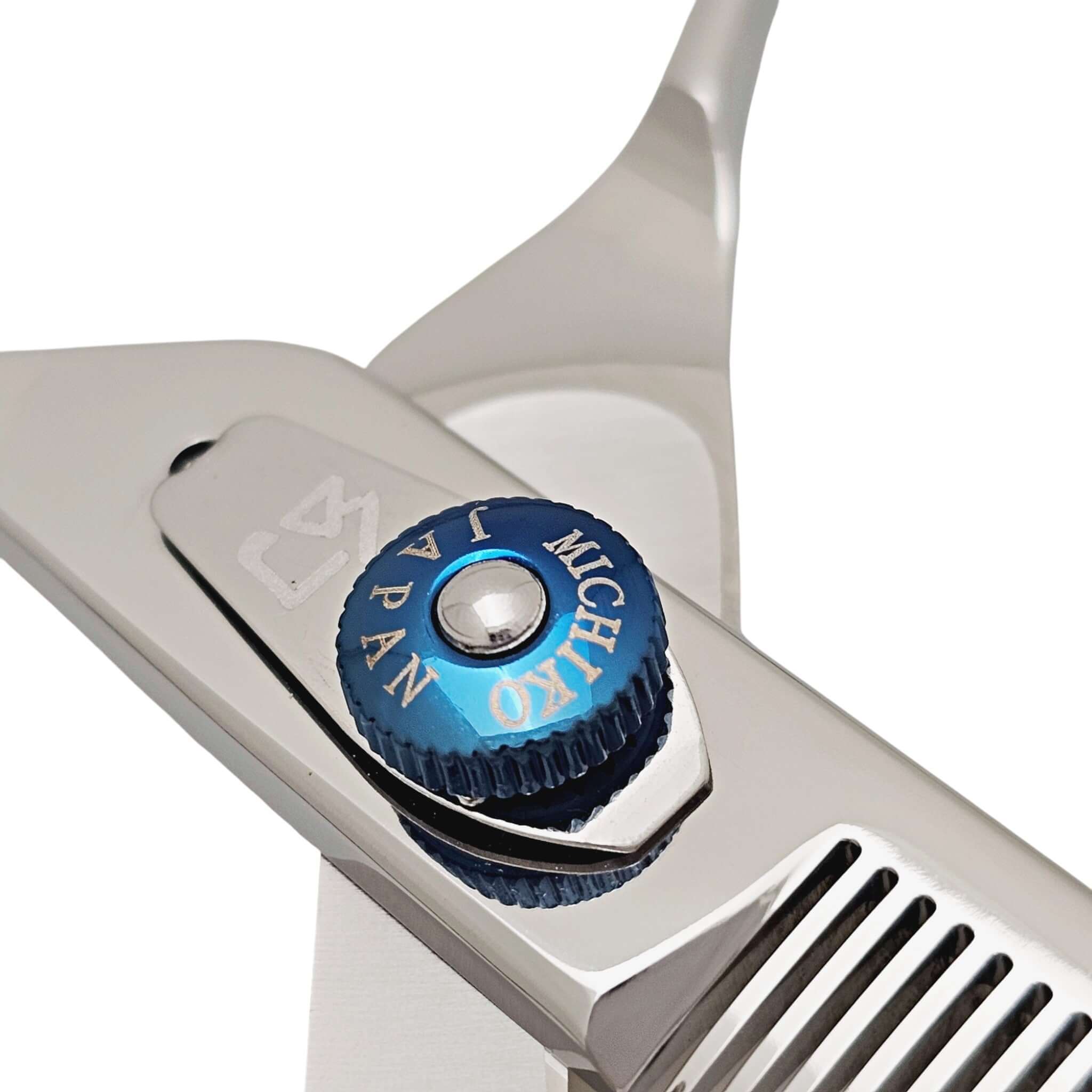 Close-up of Michiko hair shears with a blue screw on a white background