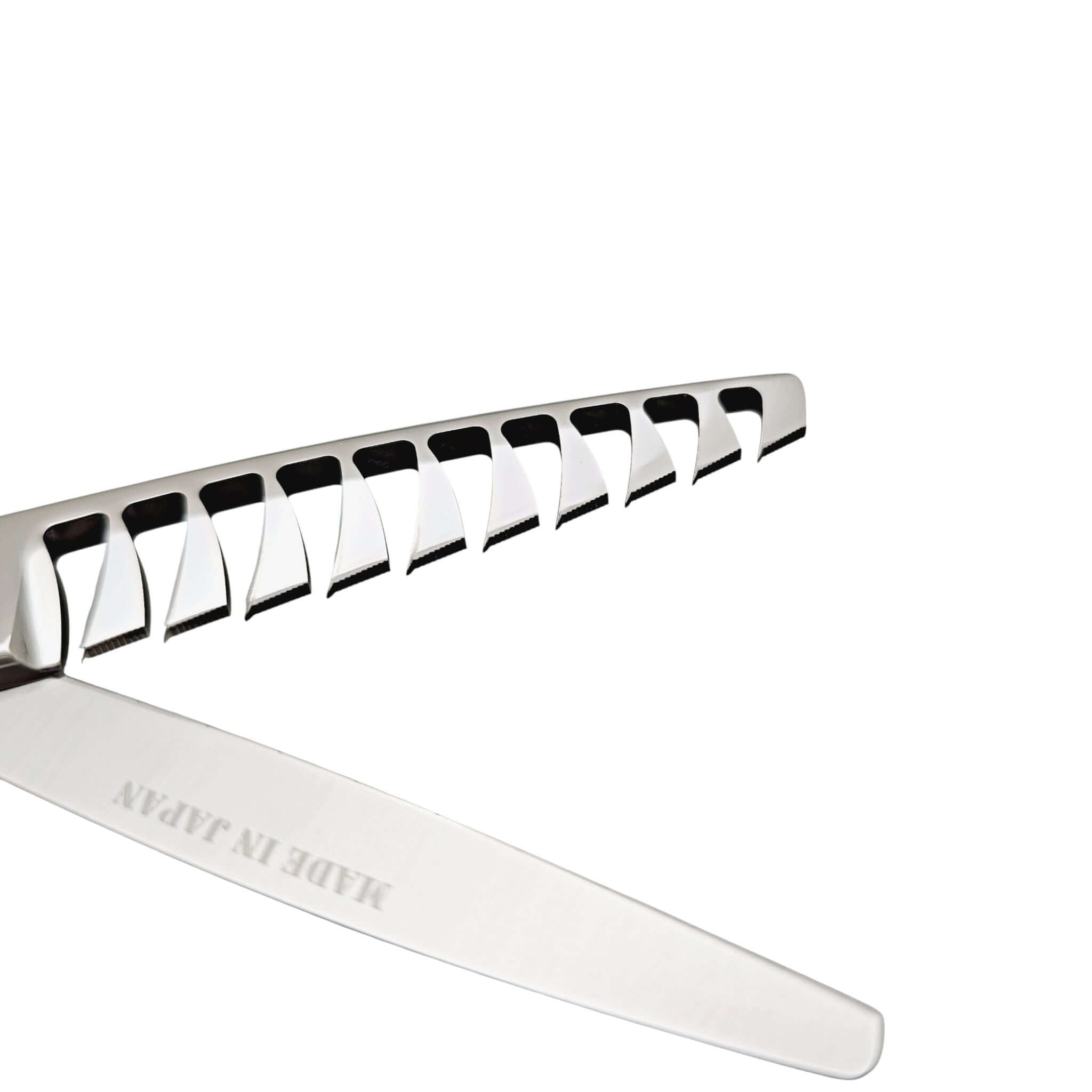 Metallic hair texturizer with 'MADE IN JAPAN' engraving on a white background
