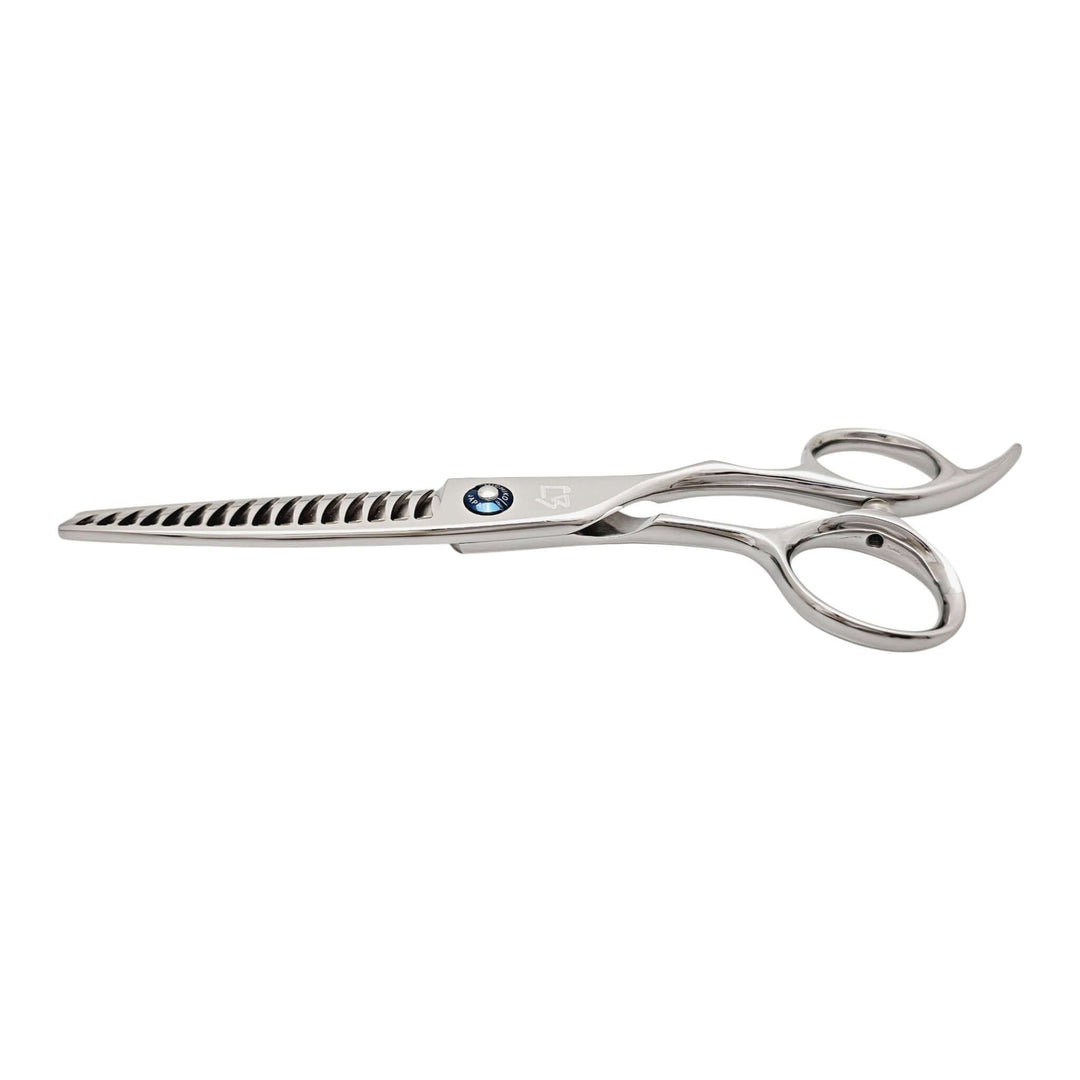 Stainless steel hair thinning scissors on a white background