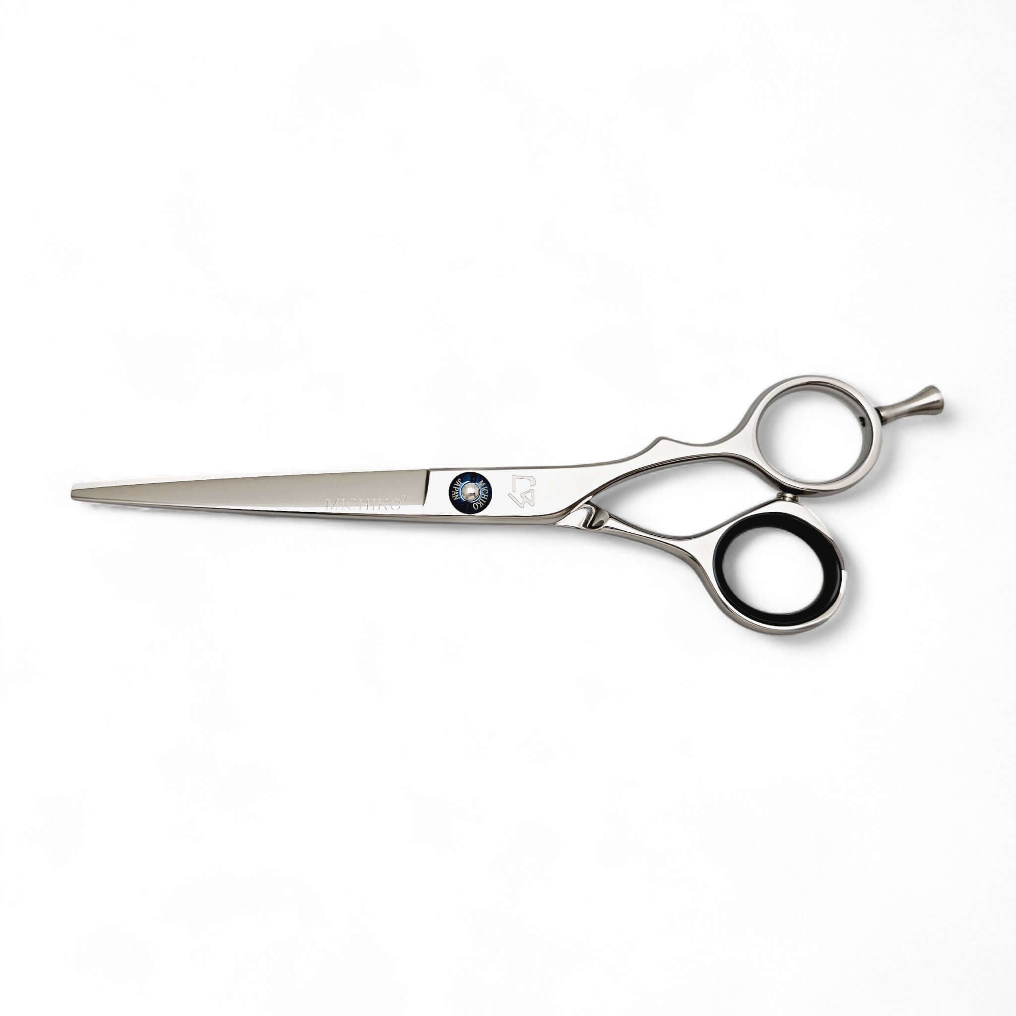 Hair cutting scissors on a white background