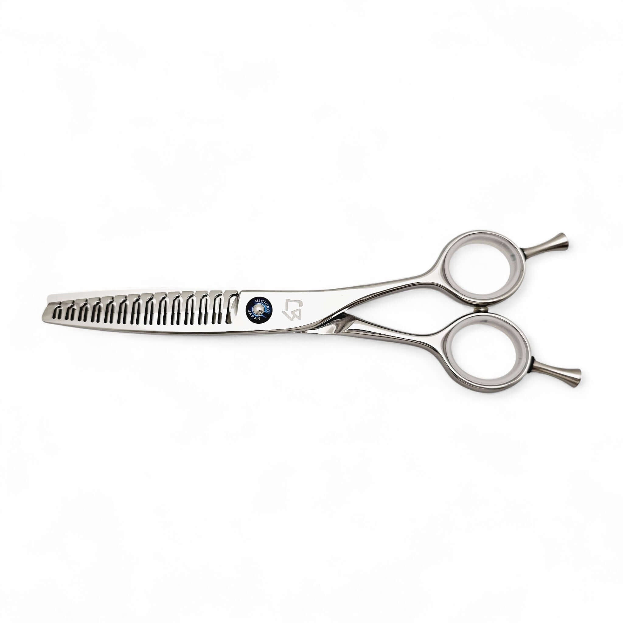 Stainless steel hair texturizer shears on a white background