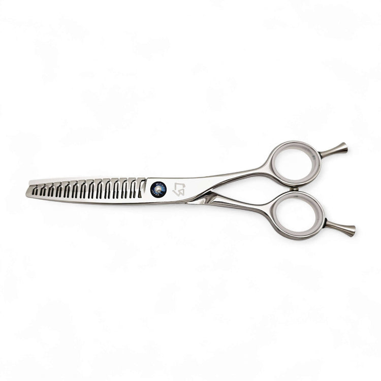 Stainless steel hair texturizer shears on a white background
