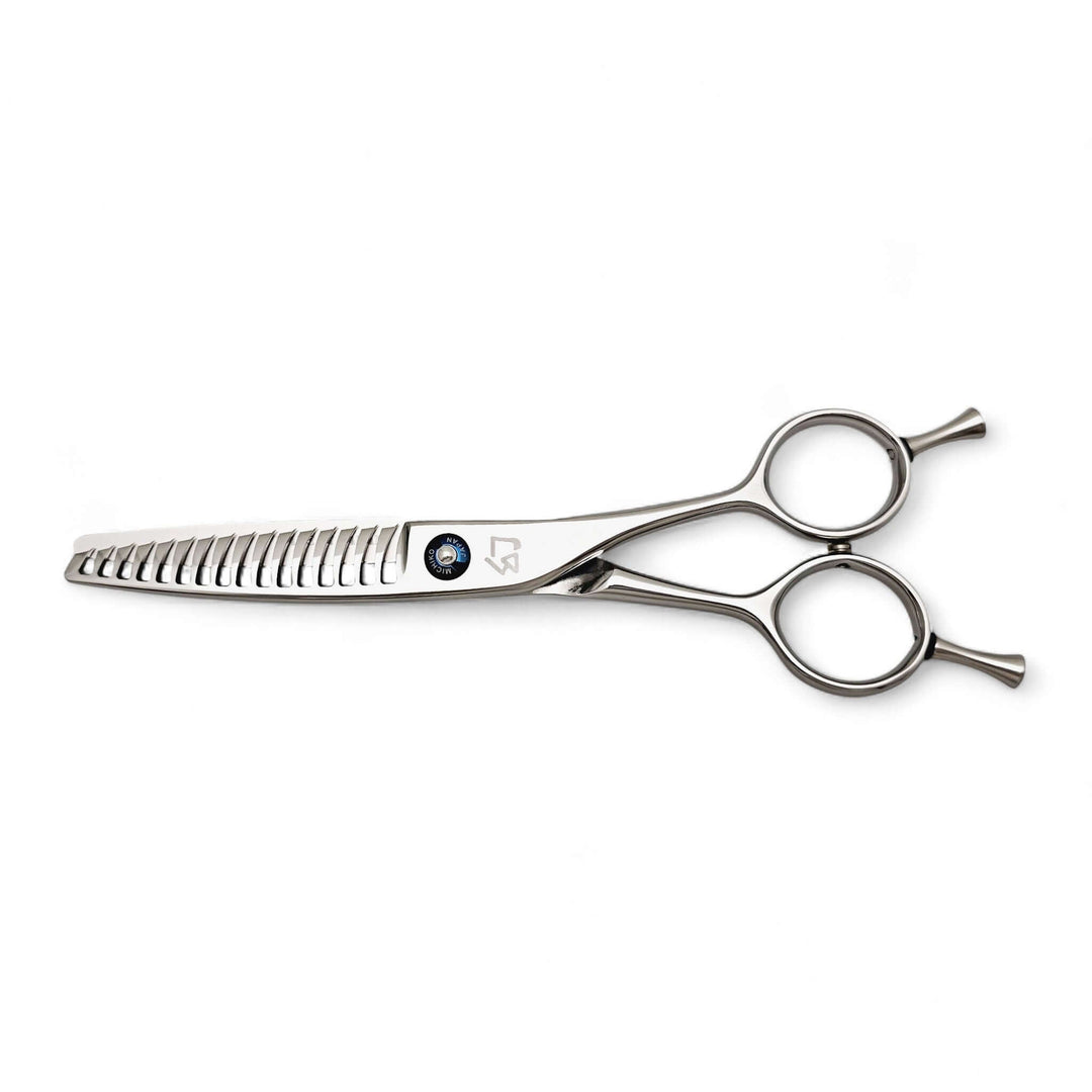 Stainless steel hair texturizing shears on a white background