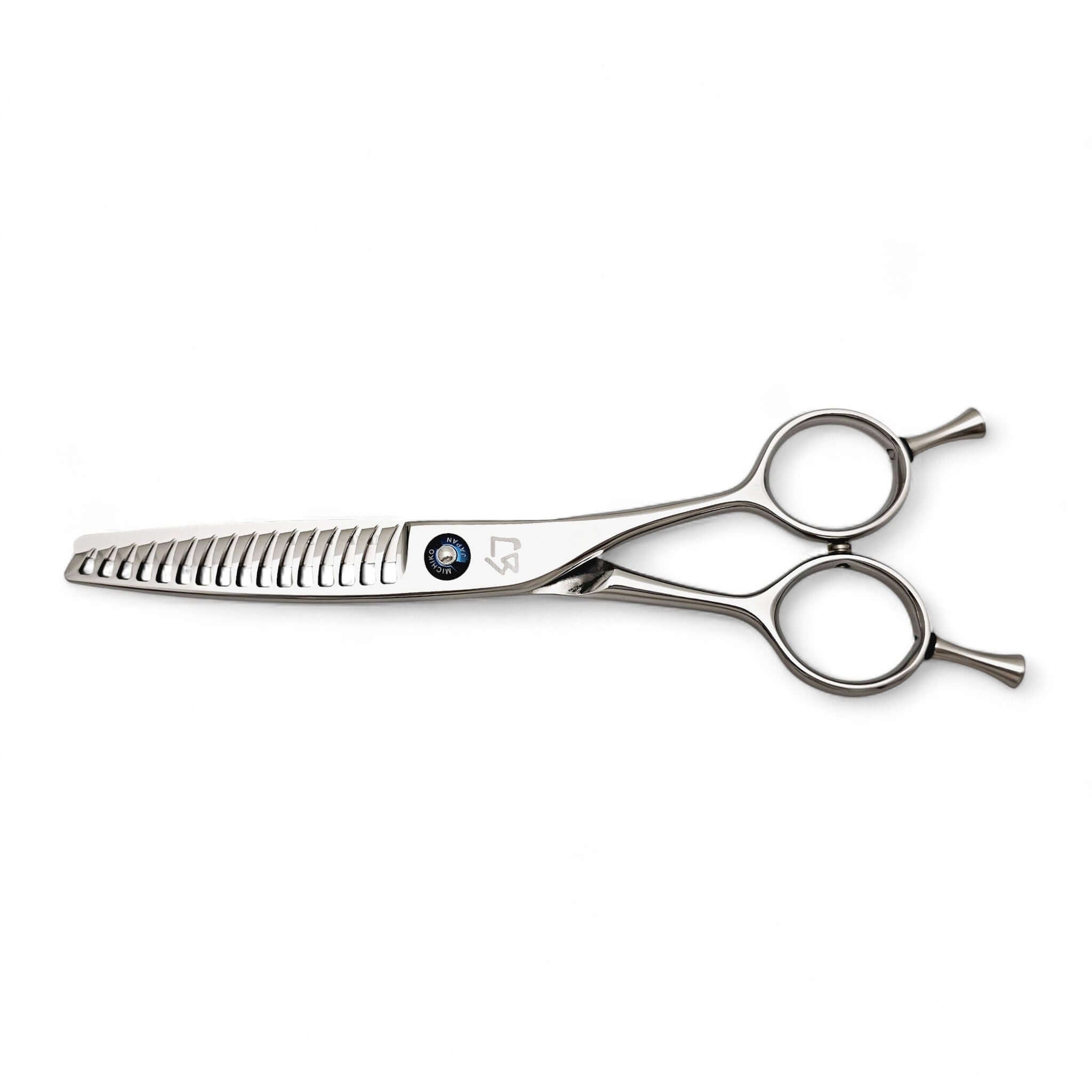 Stainless steel hair texturizing shears on a white background