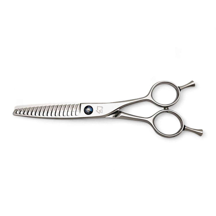 Stainless steel hair texturizing shears on a white background