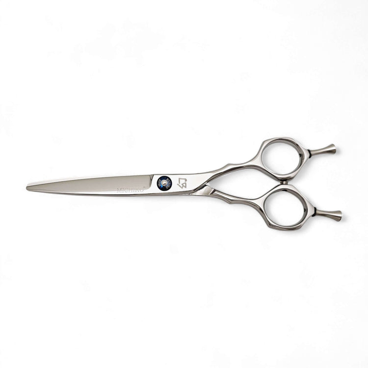 Pair of silver hair scissors with symmetric handle on a white background