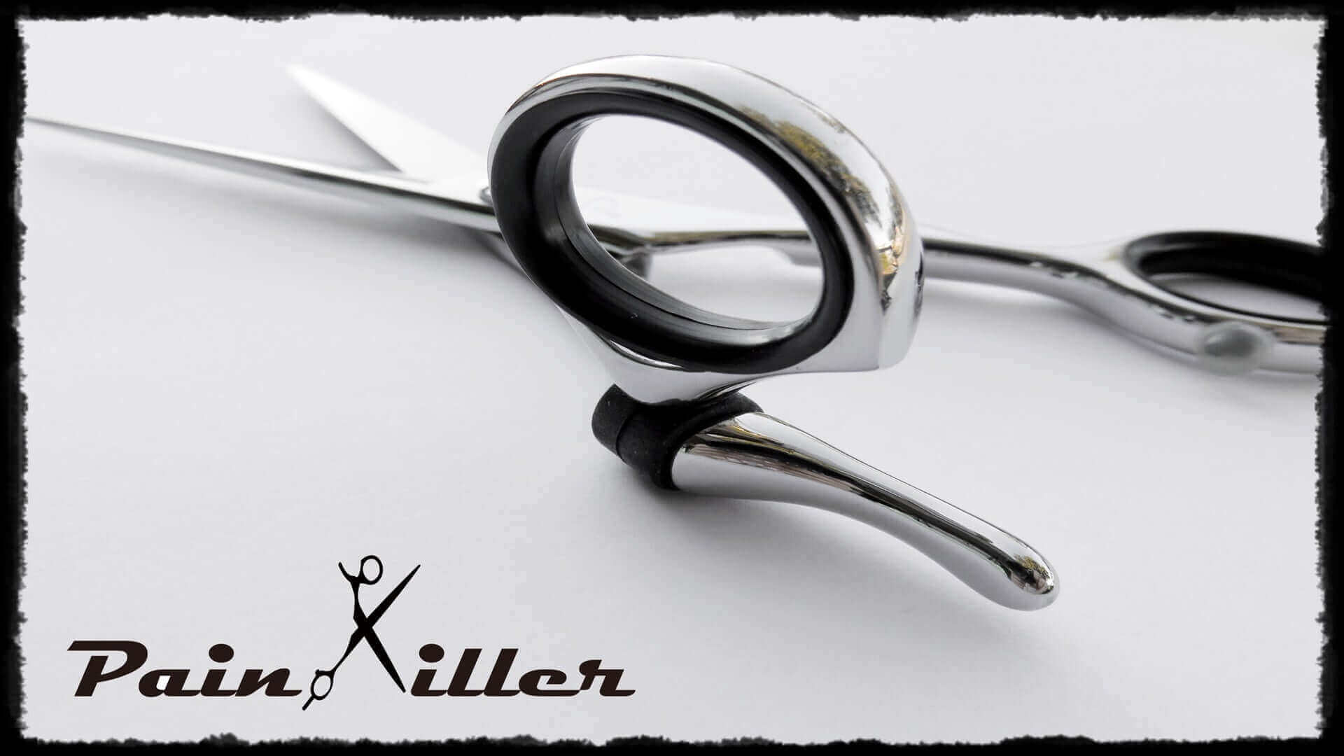 Painkiller Swivel Shears featuring ergonomic design and 360-degree rotating thumb ring – professional hair cutting scissors for hairstylists seeking precision, comfort, and reduced wrist strain.