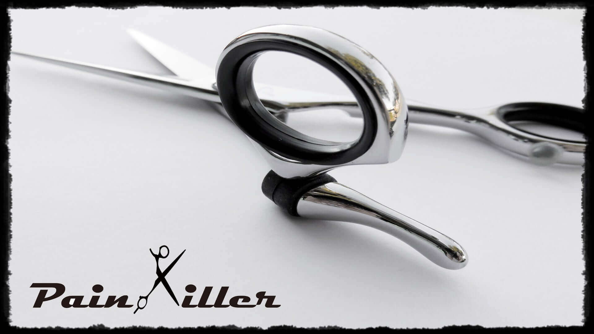Painkiller Swivel Shears featuring ergonomic design and 360-degree rotating thumb ring – professional hair cutting scissors for hairstylists seeking precision, comfort, and reduced wrist strain.