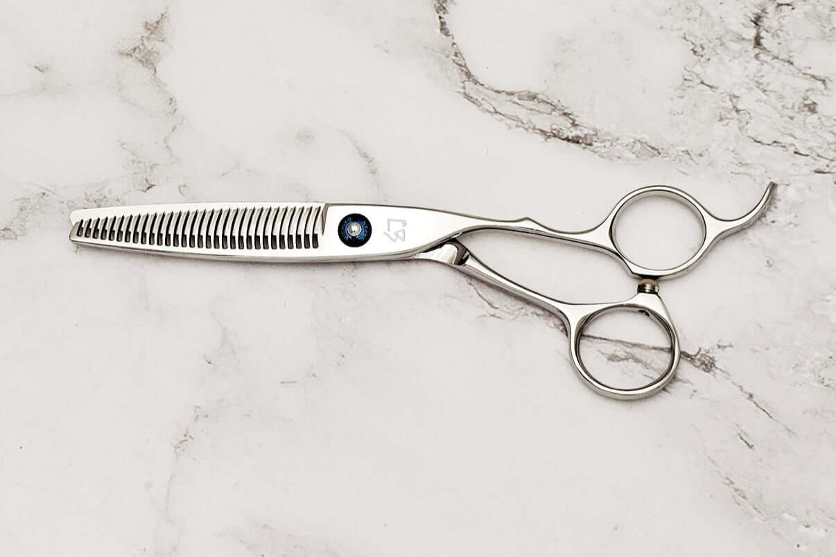 Crane handle hair thinner on a marble surface