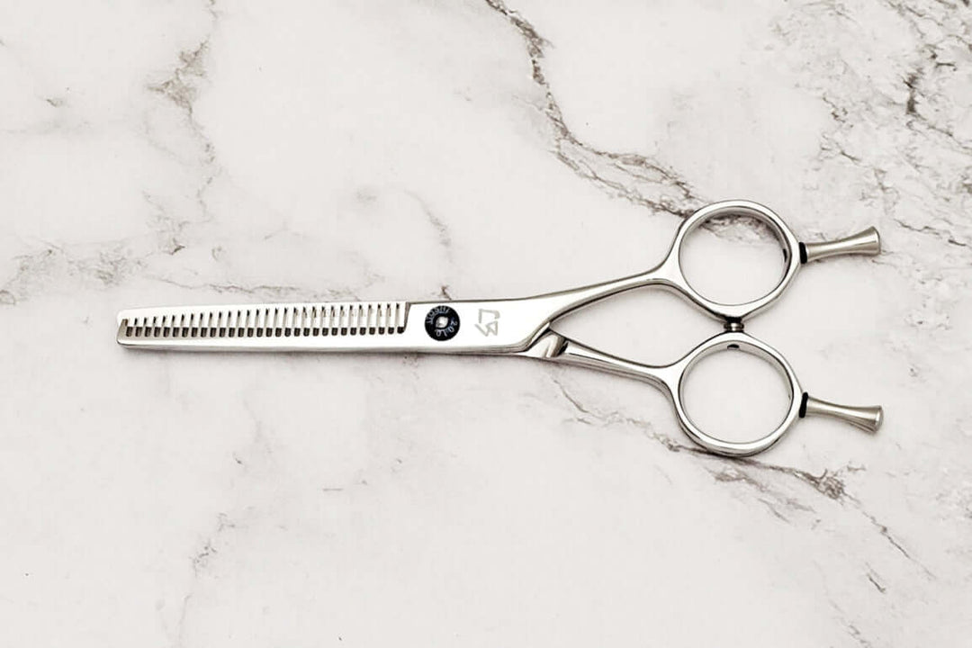 Hair thinning scissors on a white background
