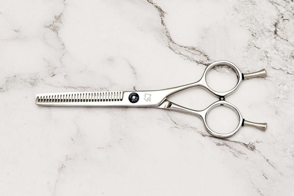 Hair thinning scissors on a white background