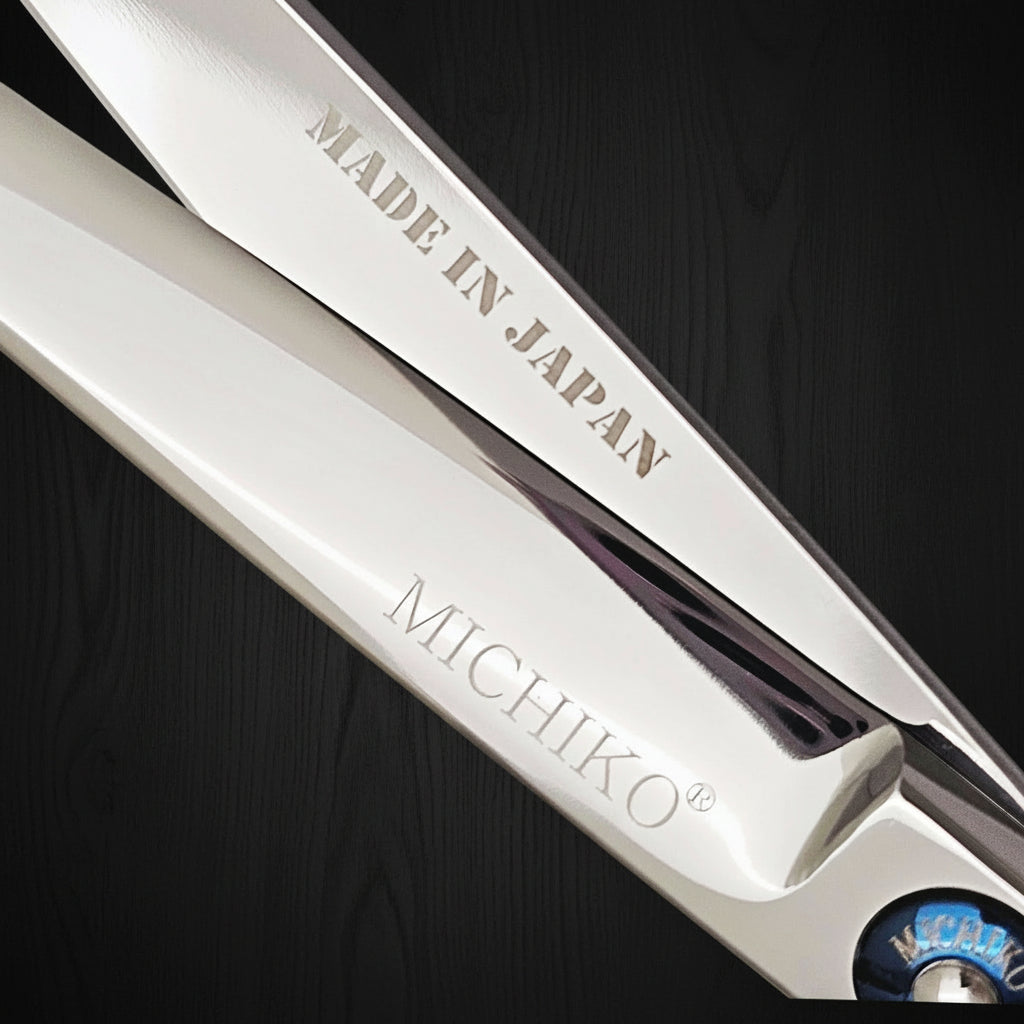Hair shears with 'Made in Japan' and 'Michiko' branding on a white background