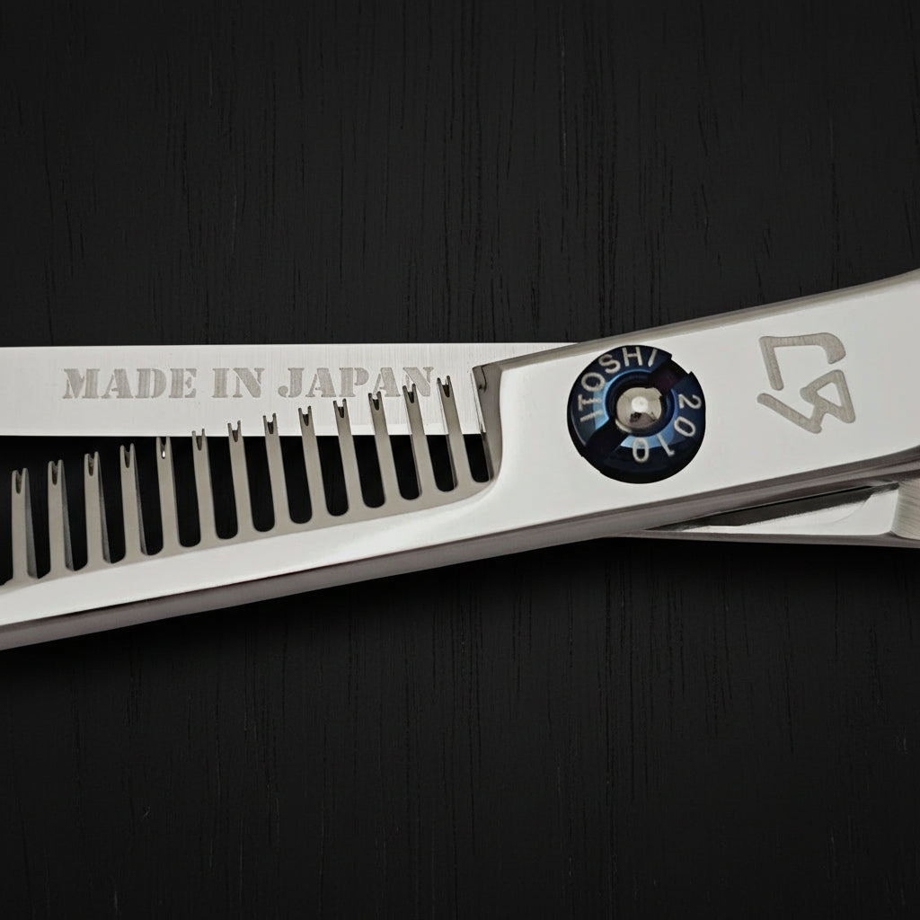 Close-up of Hair thinner with 'Made in Japan' and brand logo on a white background