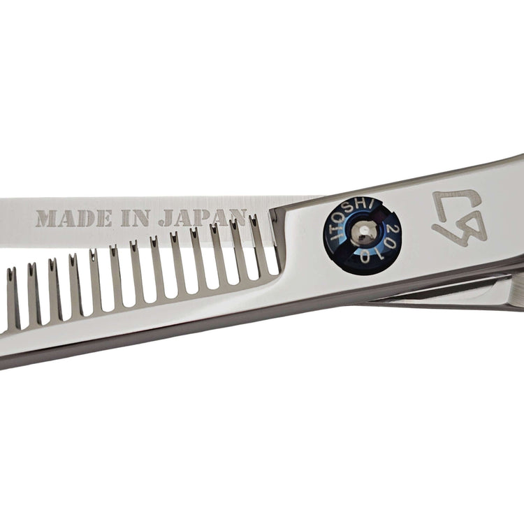 Close-up of Hair thinner with 'Made in Japan' and brand logo on a white background