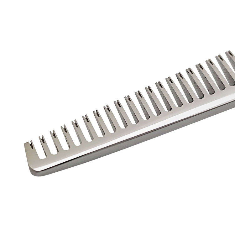 Close-up of hair thinning shears on a white background