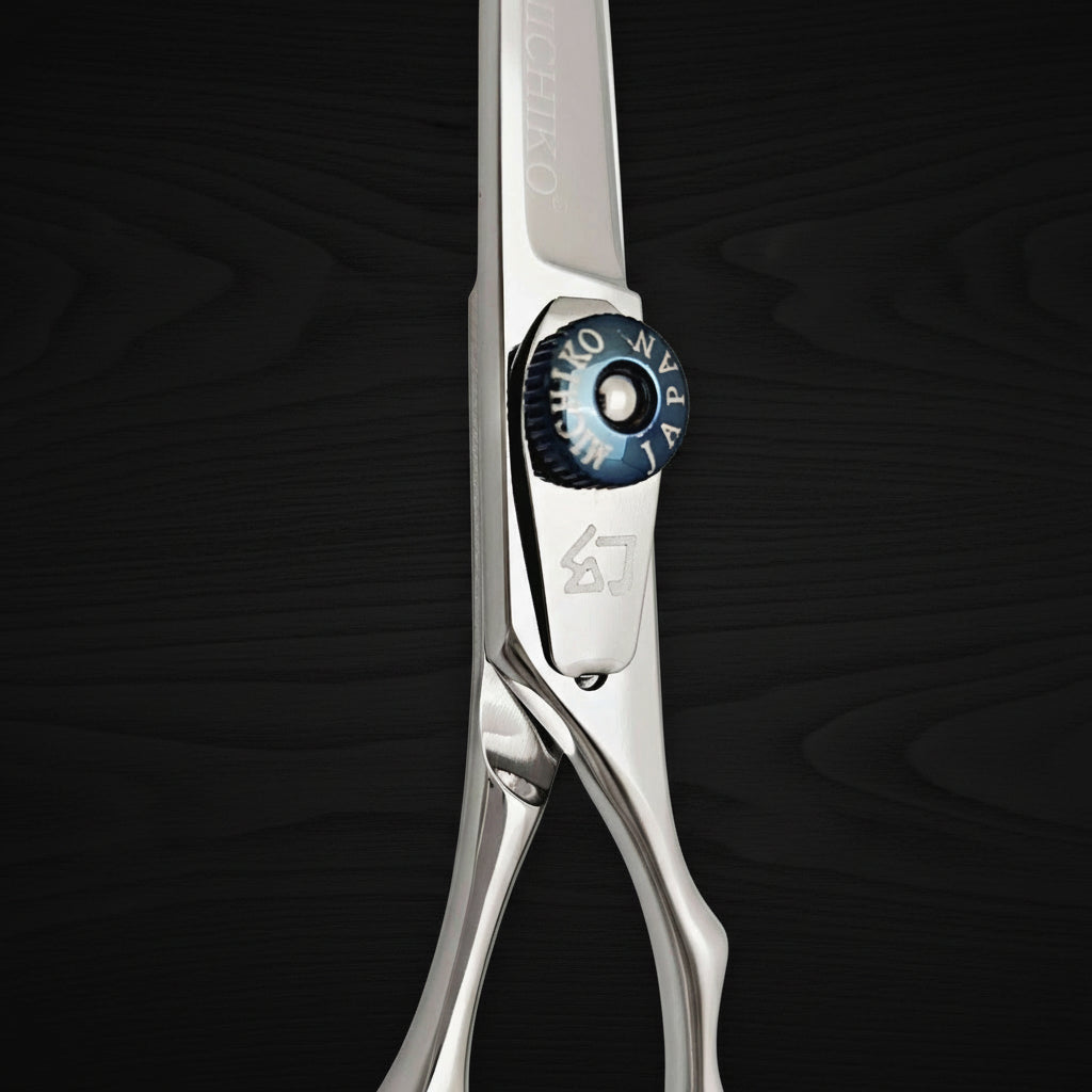 Hair shears with a brand logo on a white background