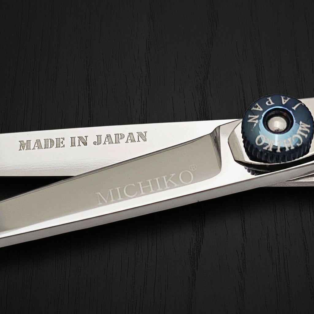 Hair shears with 'Made in Japan' and 'Michiko' branding on a white background