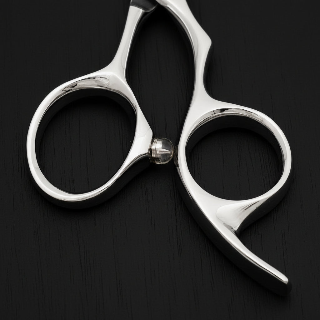 Close-up of a pair of hair scissors on a white background