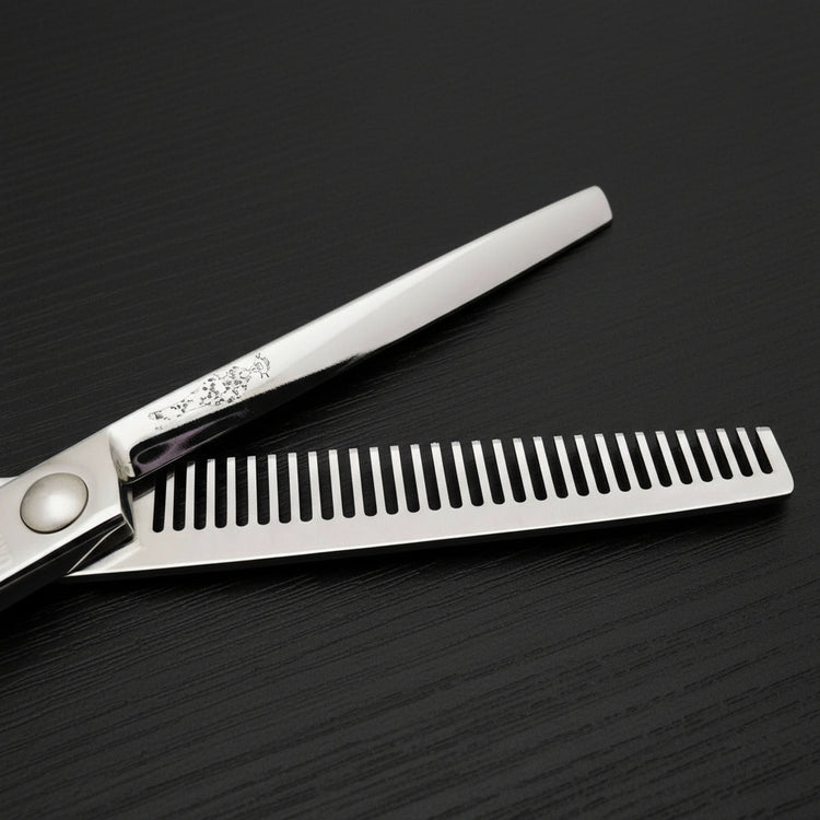 Hair thinning scissors on a black background