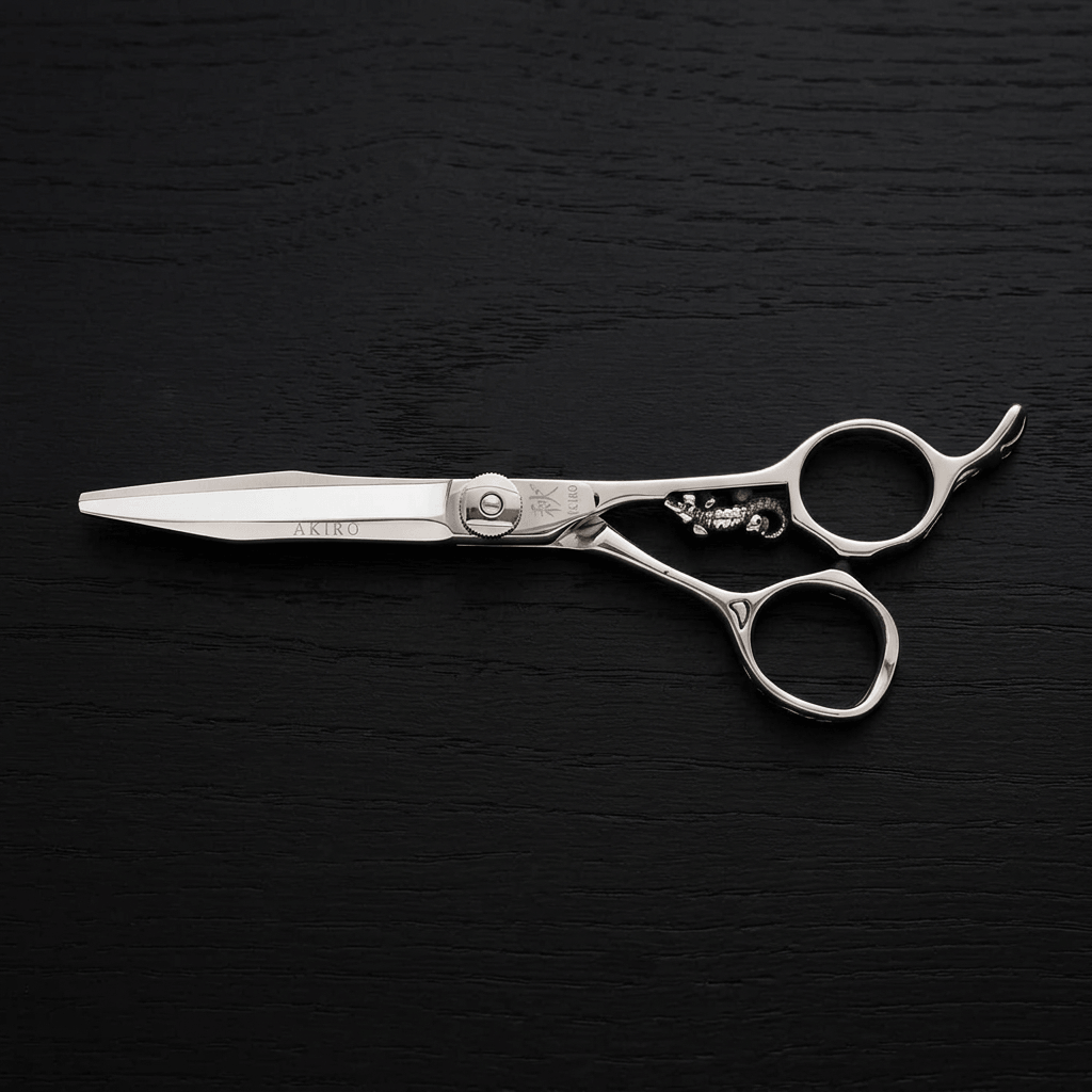 Barber shears on a balck background.
