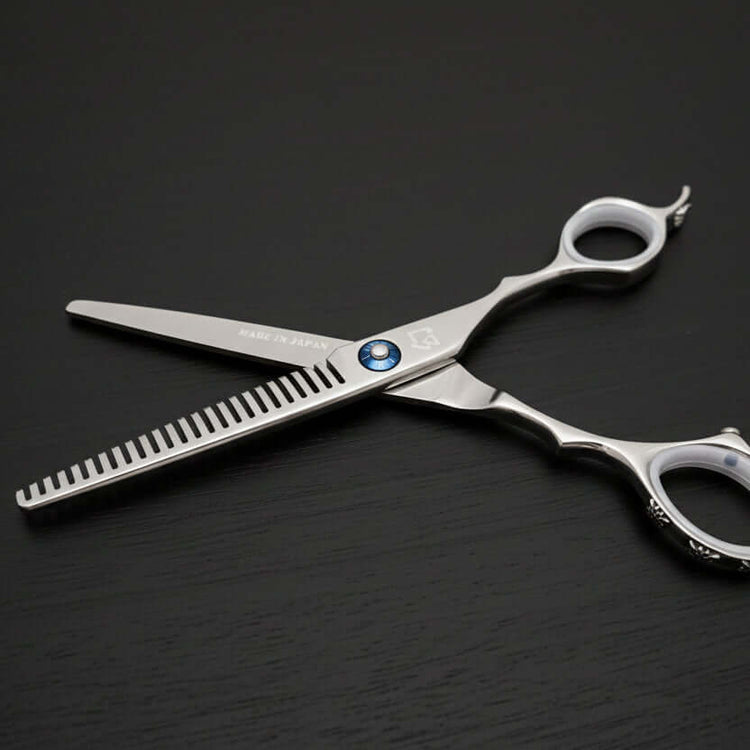Hair thinning scissors with a black background