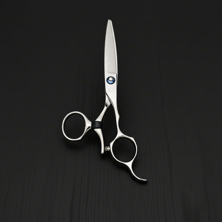 Swivel Hair cutting scissors on a black background