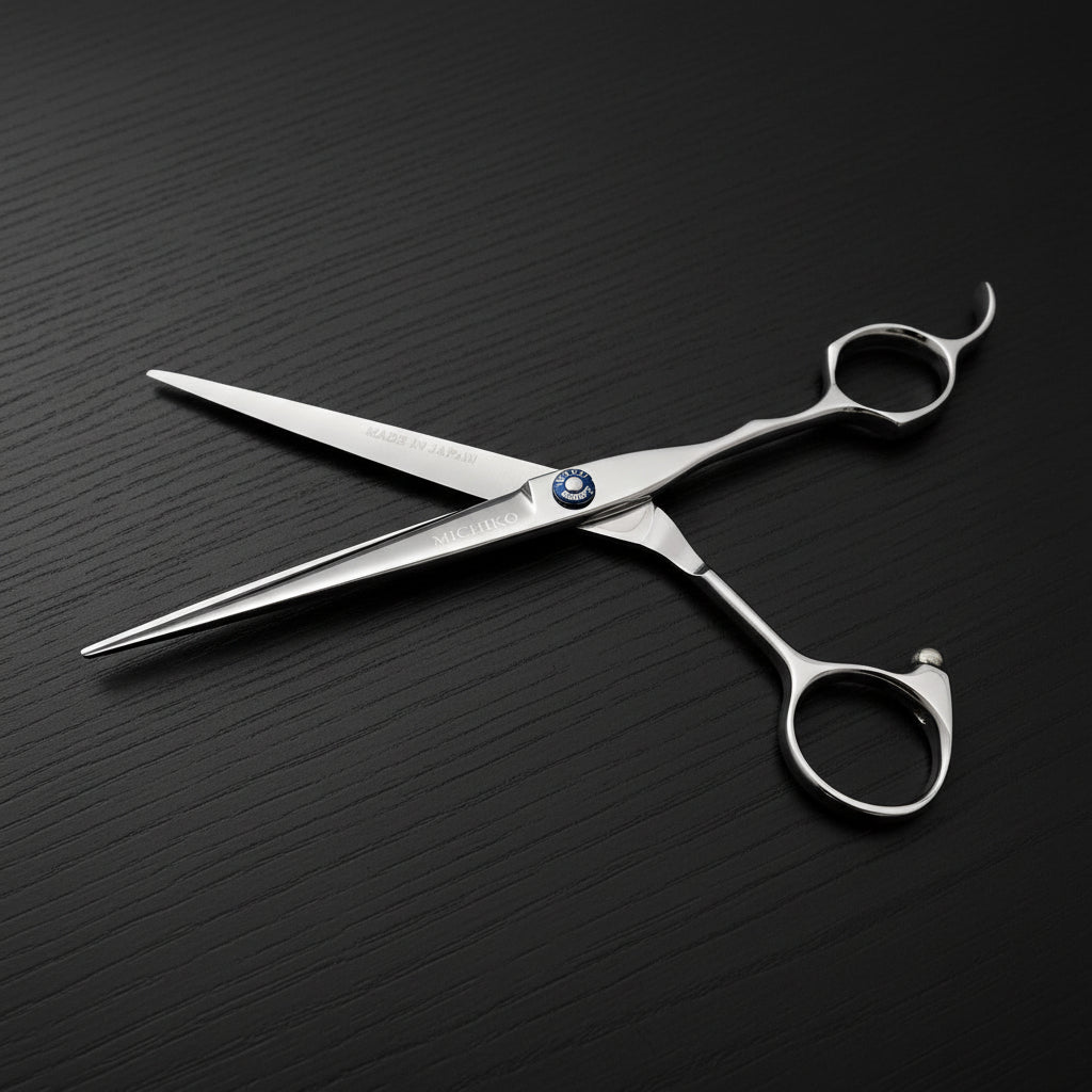 Silver hair scissors on a black oak textured background