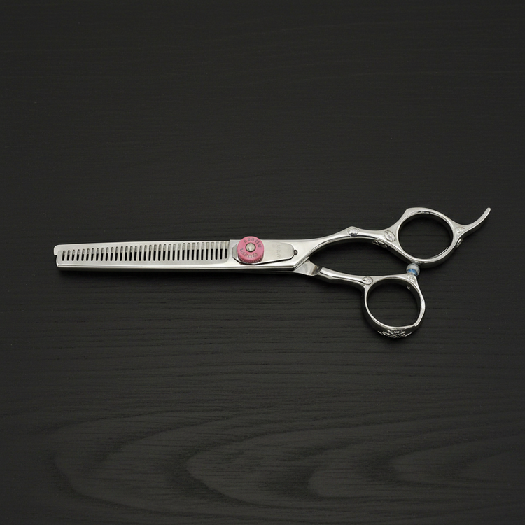 Hair thinning scissors on a black background