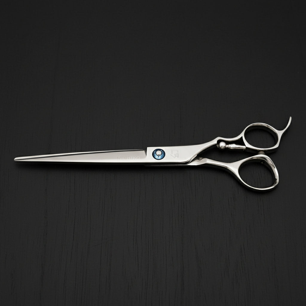 Stainless steel hair cutting scissors on a white background