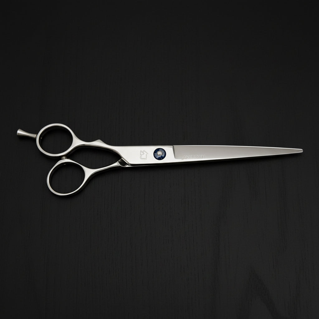 Hairdressing scissors on a white background