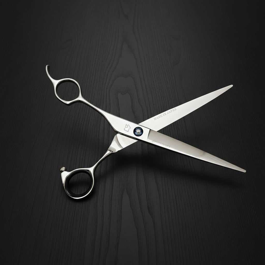 Hair cutting shears on a black oak textured background