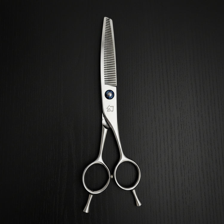 Hair thinning scissors with a brand logo on a black background