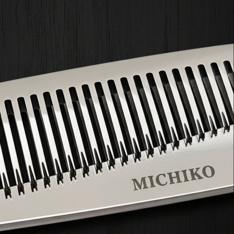 Close-up of a thinning blade of hair shears with 'Made in Japan' text on a black background