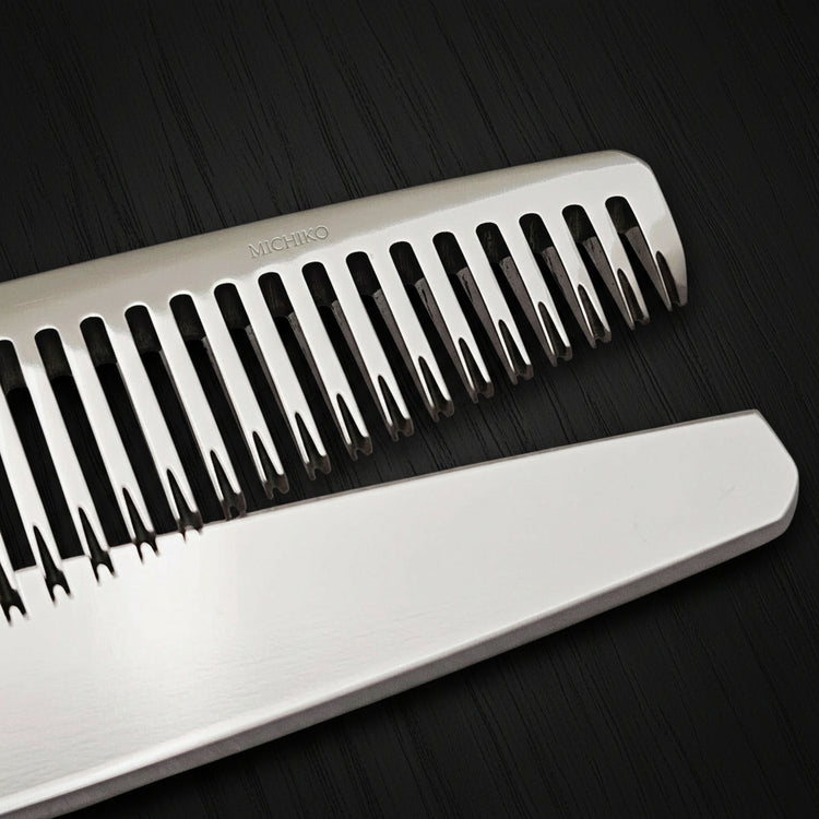 Close-up of a hair-thinning blade on a black background